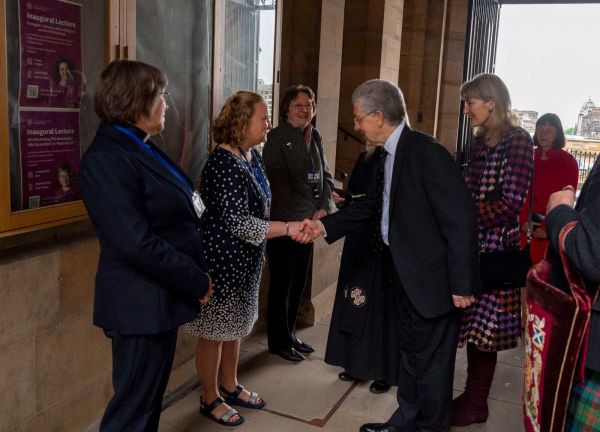 Lord Hodge is greeted as he arrives at Assembly Hall