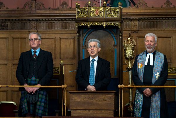 Lord High Commissioner and other guests singing at Tuesday's opening worship