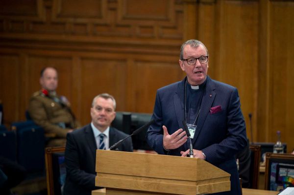 Rev Scott Brown delivers the report of the Chaplains