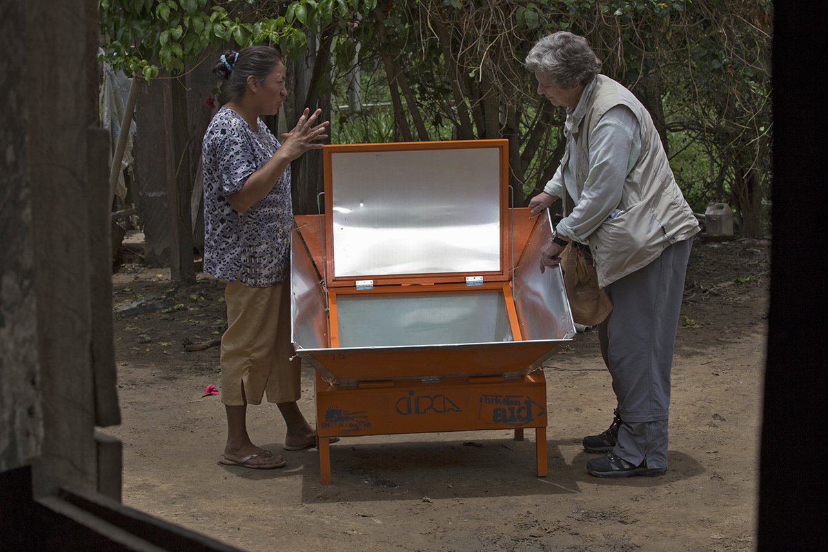 Trish Gentry meets with Esther who was gifted a solar oven through Christian Aid donations