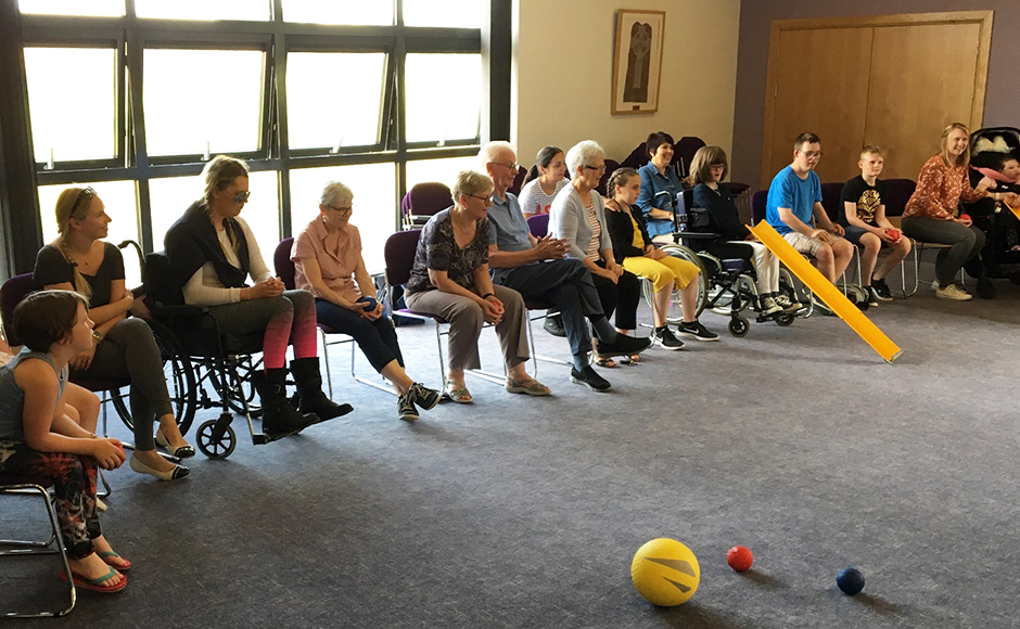 People taking part in a Boccia session