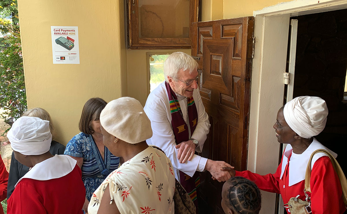 Rt Rev Colin Sinclair meets with locals in Zambia during a church service