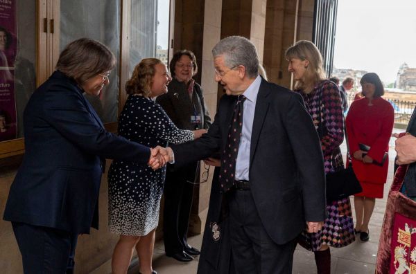 Lord Hodge is greeted as he arrives at Assembly Hall