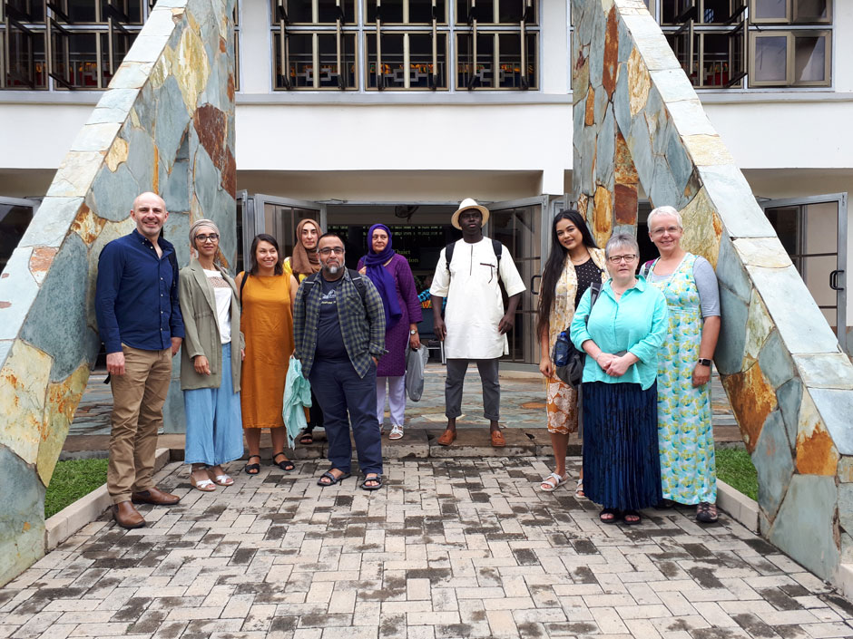 Group of people standing outside a building