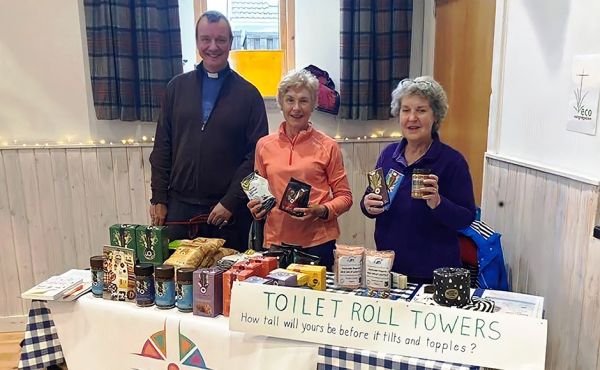 Buchlyvie and Gartmore minister Rev Scott Brown joins church members Tricia Cumming and Carol Irvine on the EcoCongregation stall at Gartmore's gala day.