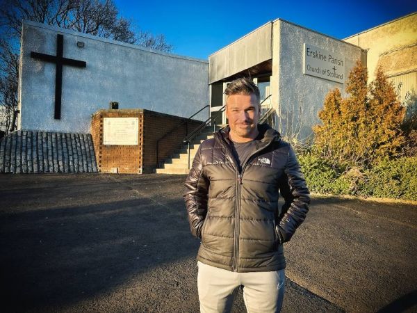Rev David Nicolson stands outside Erskine Parish Church
