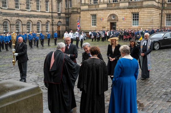 Attendees being greeted outside St Giles