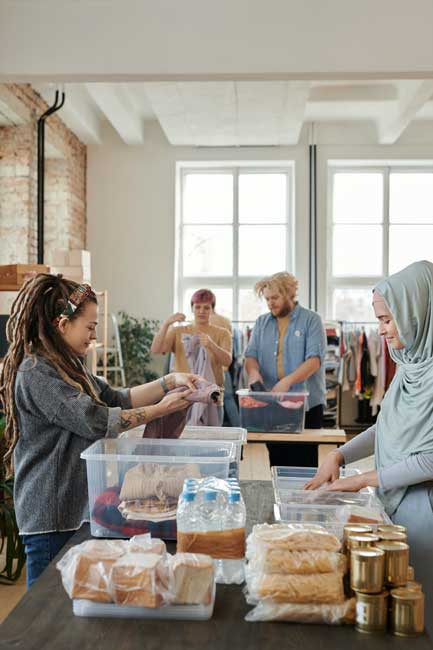 Volunteers Sorting Donations