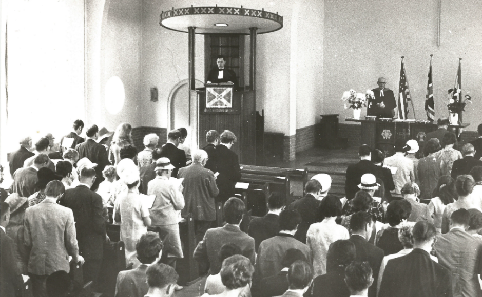 Service in 1970 commemorating the 350th Anniversary of the Pilgrim Fathers departure from Holland. The person behind the Communion Table is Dr Eugene Carson Blake, General Secretary of the World Council of Churches, a prominent American Presbyterian Minister who too0k part in the march on Selma to end segregation and was prominent in the Civil Rights movement. Rev John Russell is preaching behind the pulpit.