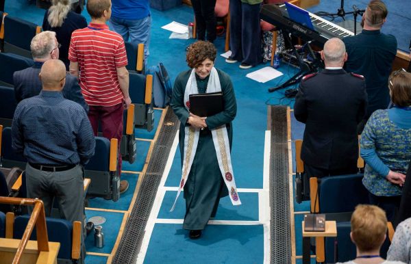 The Moderator walks up the aisle at Assembly Hall