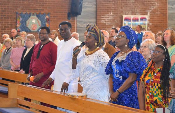 African congregation members lead praise at the Africa Day service