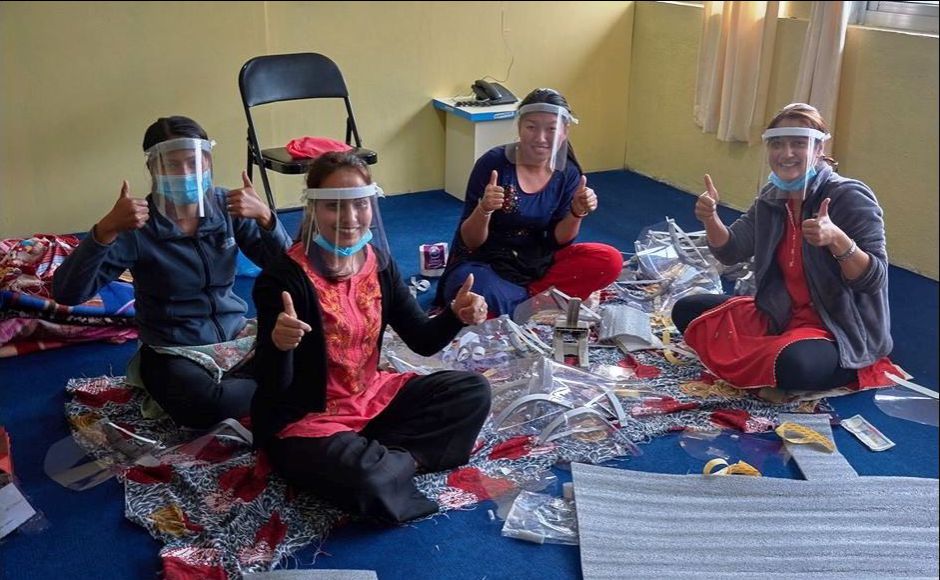 Nurse tutors in Nepal making protective visors