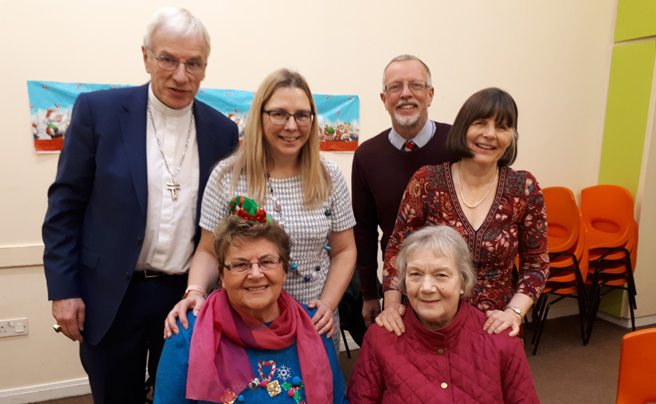 Rt Rev Colin Sinclair with Ruth Sinclair, development worker Louisa Turner, Rev Robin McAlpine and two volunteers who run the after school club