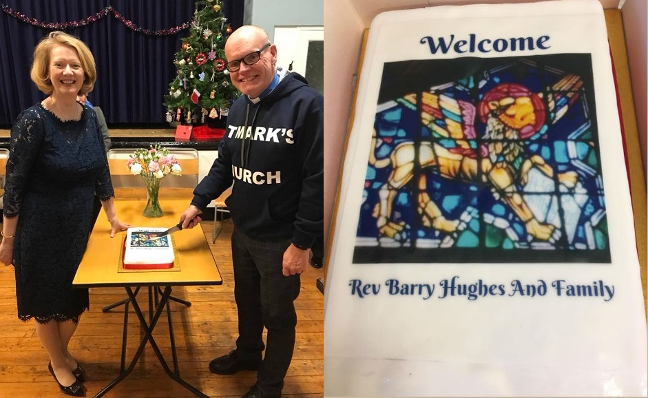 Gillian and Barry Hughes celebrating with a stunning cake 