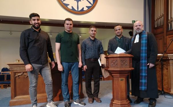 Rev Wes Brandon with four of the original Iranian members of the congregation.