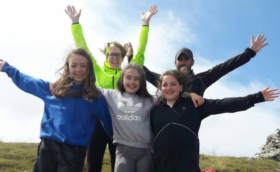 Group leaders Nicola and Archie and three of the group’s members, Eubha, Caramarie and Emily, after reaching the summit of Beinn na Crow, a 575m climb