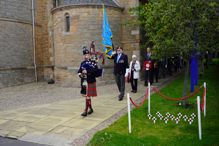 Piper Leads Out Dedication Parade Party