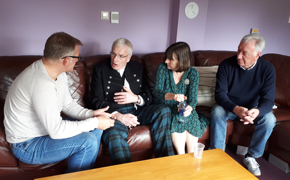 Rt Rev Colin Sinclair, Moderator of the Church of Scotland and his wife Ruth, with two volunteers at Rainbow House