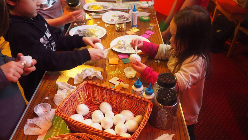 Children making crafts at Messy Church in Murrayfield Parish Church