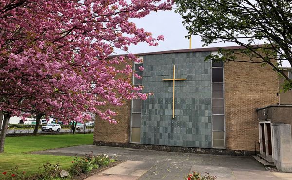 The St Nicholas Church, Sighthill, church building with cherry blossom infront