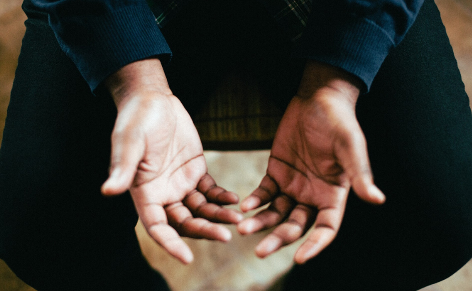 Man's hands praying