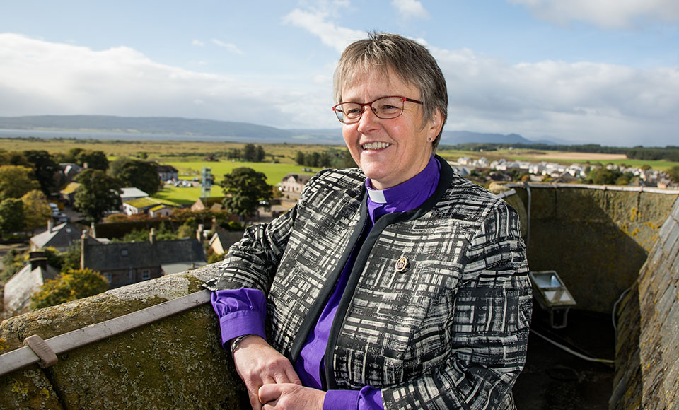 Susan Brown standing on the roof of Dornoch Cathedral