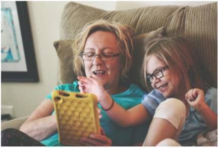 Older woman and child reading