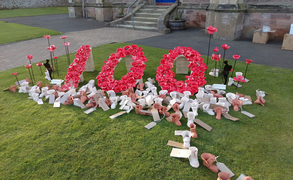Eyemouth Parish Church's poppy display with ceramic soldier boots