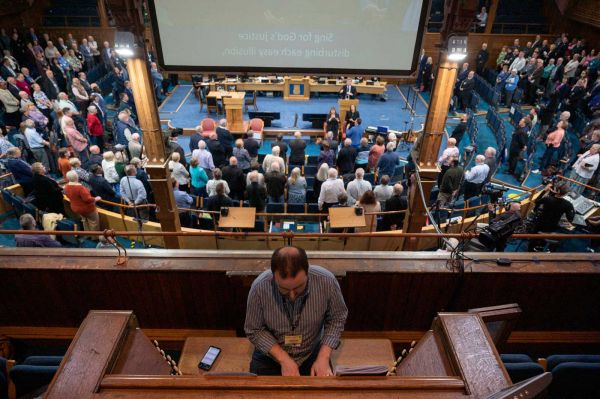 Organist playing during Tuesday's opening worship